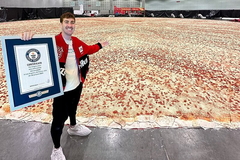 Napravljena najveća pizza na svijetu: Prostire se na više od jednog dunuma i ima 68.000 kriški