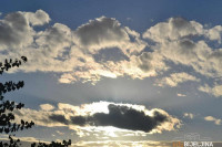 Sutra oblačno sa sunčanim periodima, na jugu kiša